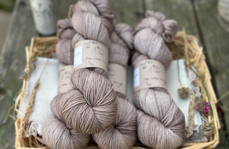 Four skeins of hand dyed light brown yarn