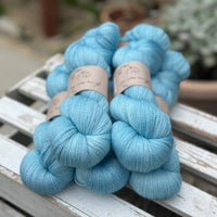 Five skeins of bright blue yarn