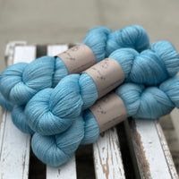 Five skeins of bright blue yarn