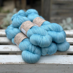 Five skeins of bright blue yarn