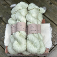 Five skeins of pale green yarn