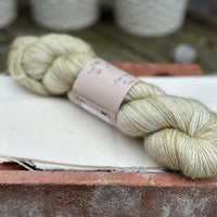 One skein of greenish brown yarn