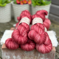 Five skeins of red yarn