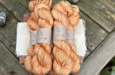 Five skeins of orange yarn