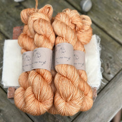 Five skeins of orange yarn