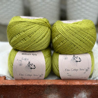 Balls of green yarn