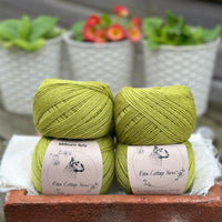 Balls of green yarn