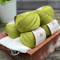 Balls of green yarn