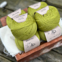 Balls of green yarn