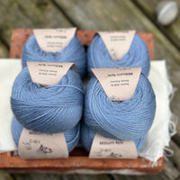 Balls of blue yarn