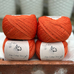 Balls of orange yarn