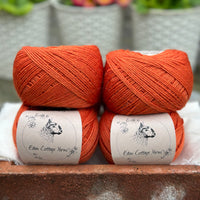 Balls of orange yarn