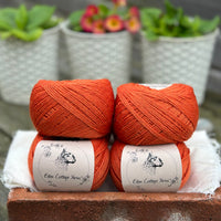 Balls of orange yarn