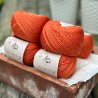 Balls of orange yarn