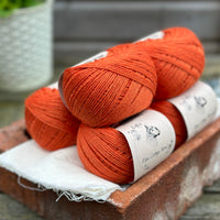 Balls of orange yarn