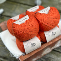 Balls of orange yarn