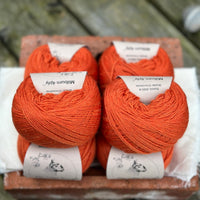 Balls of orange yarn